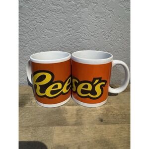 Reese's Set of 2 Galerie Orange Ceramic Coffee Mugs With Yellow Logo
